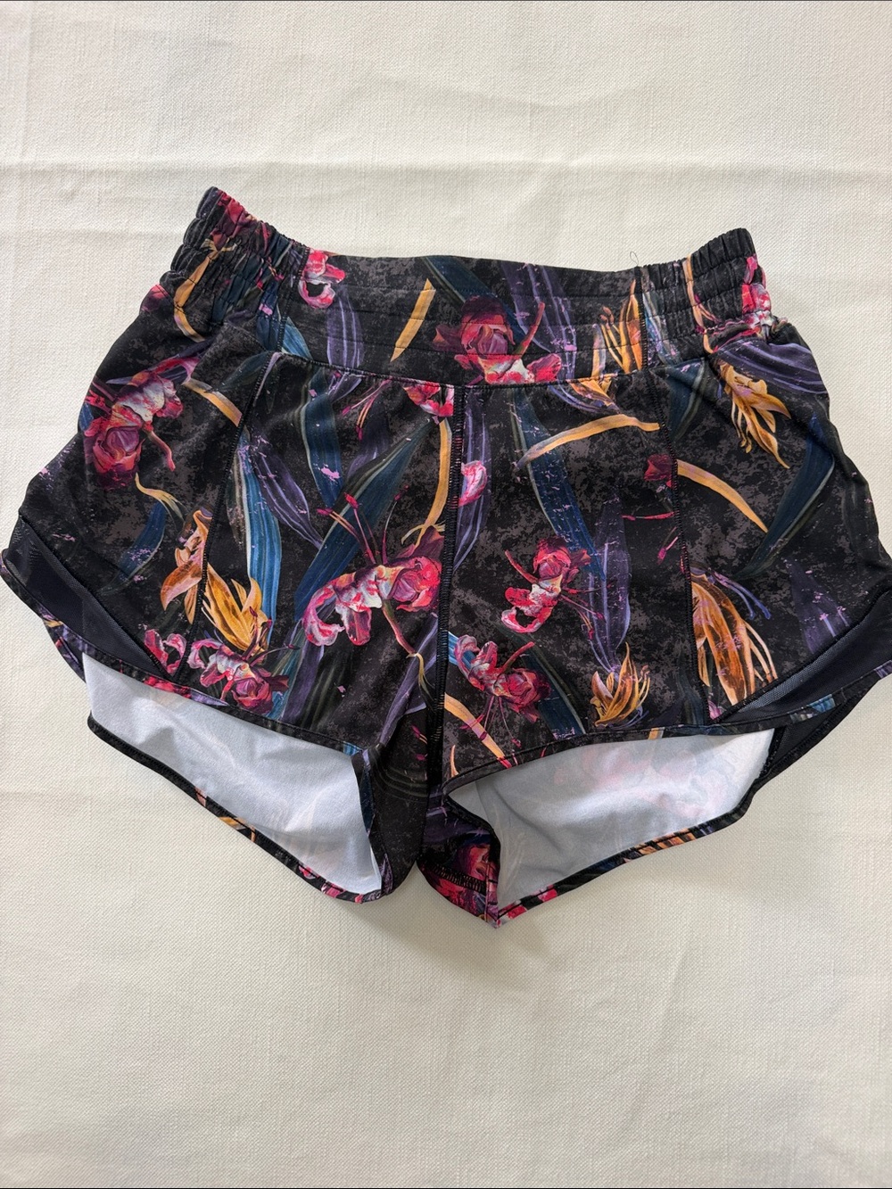 lululemon athletica Black Floral Athletic Shorts with Pink and Gold Accents